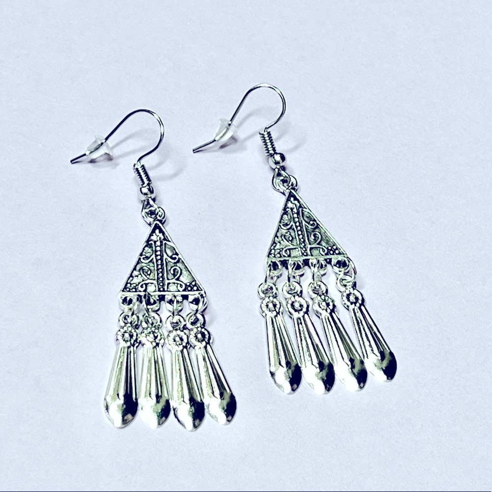 Silver tone dangle earrings